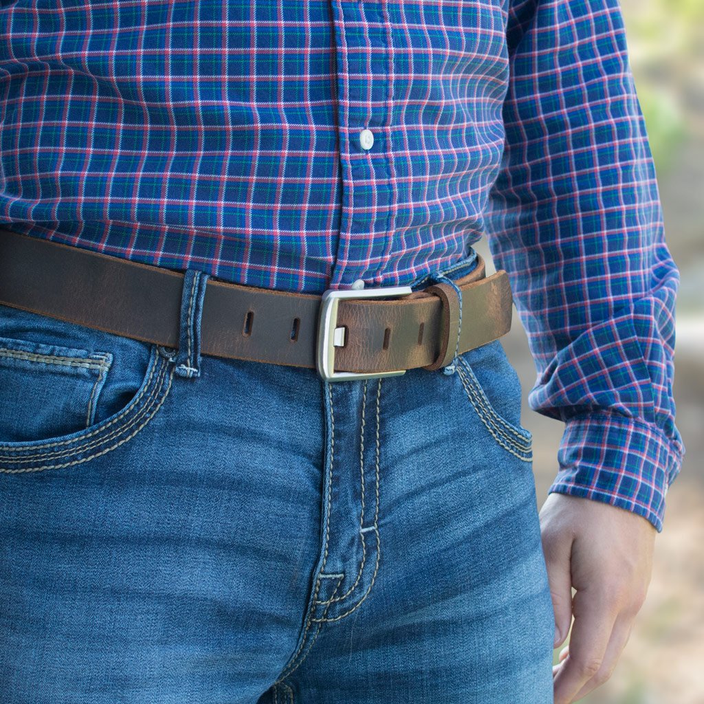 Titanium Wide Pin Distressed Brown Leather Belt by Nickel Smart® on a model in jeans