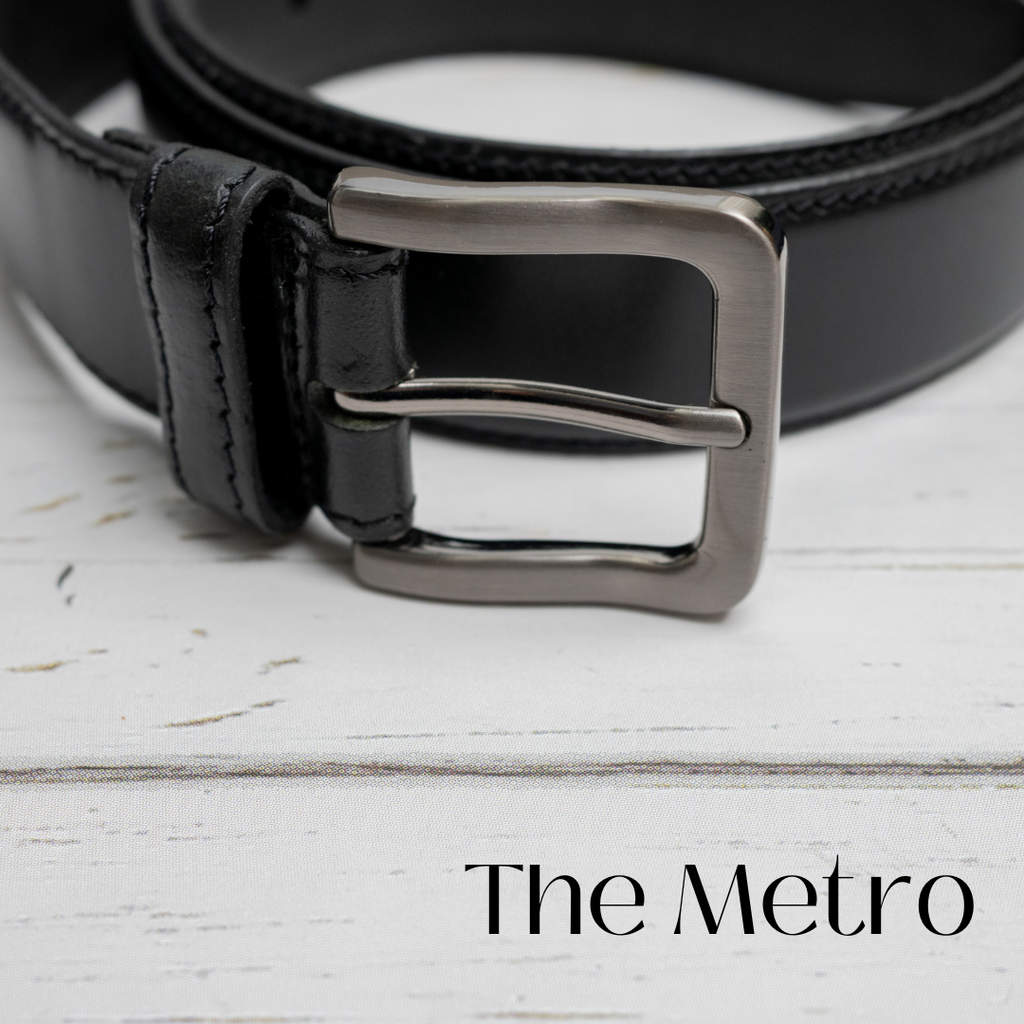 Image of Metro Black Leather Belt wrapped up. Silver antiqued buckle with rounded edges.