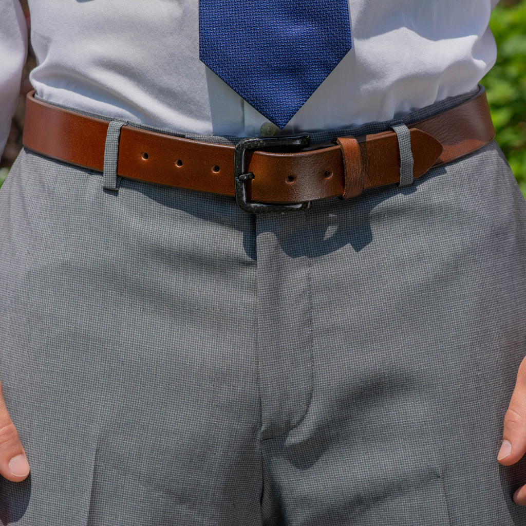 The Specialist Brown Belt by Nickel Smart® on a model with gray slacks