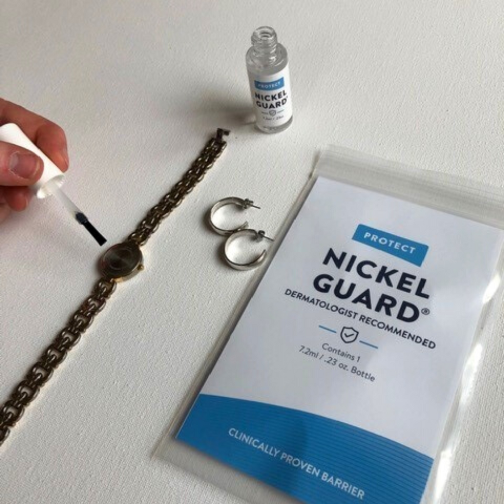 Nickel Guard being applied to back of watch. It can also be used on earrings, necklaces and glasses.