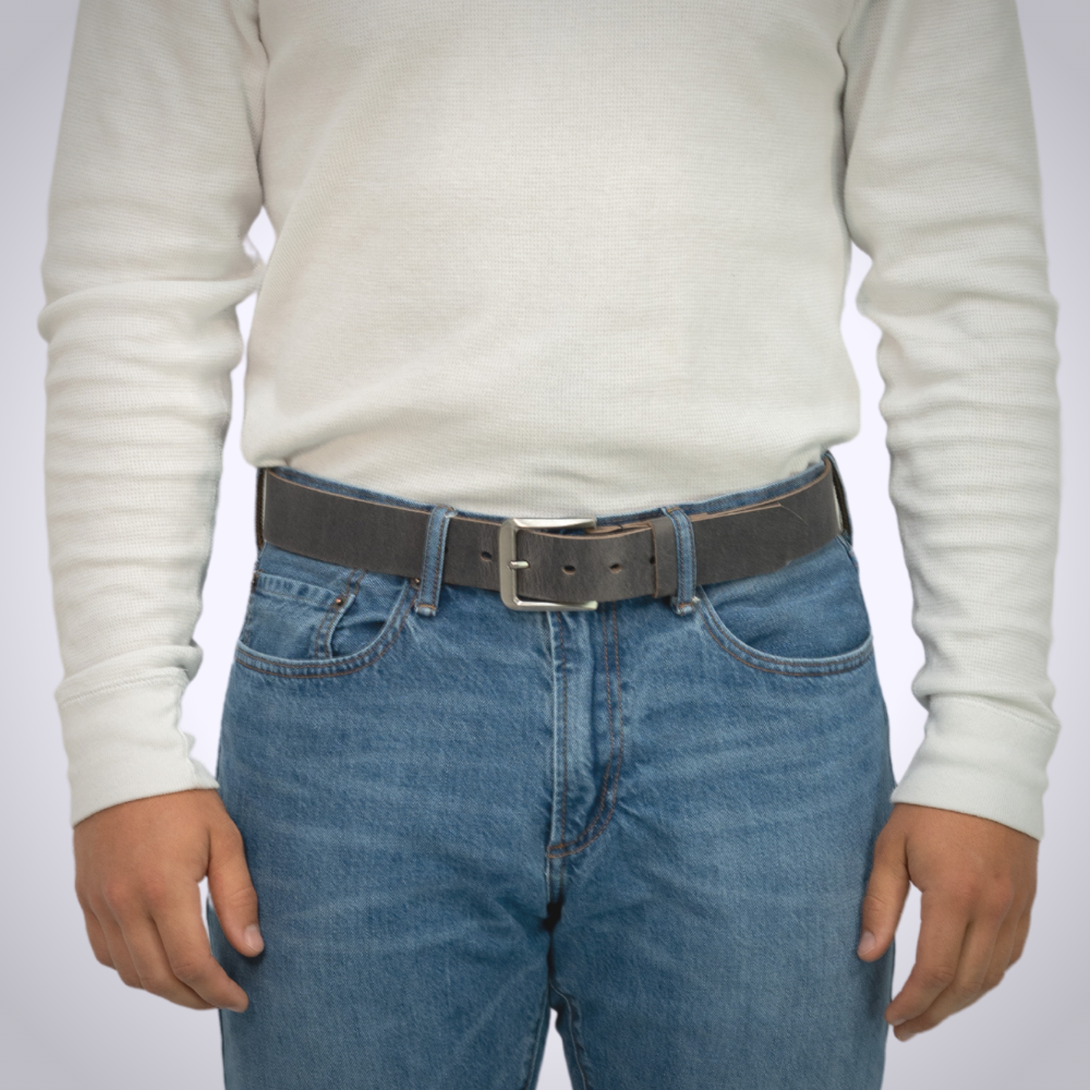 Smoky Mountain Titanium Distressed Leather Gray Belt by Nickel Smart® on a model in jeans
