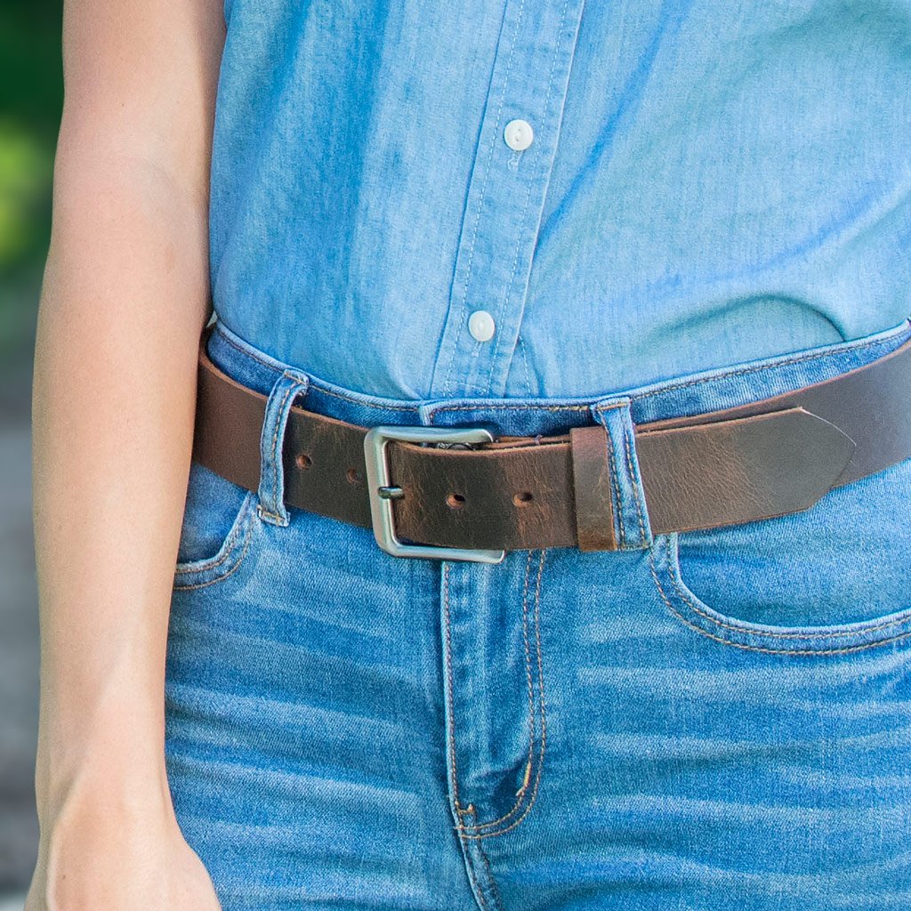 Image of brown distressed leather belt with silver nickel free buckle. Roan Mountain Distressed Leather Belt. Made in USA. Certified Nickel Free